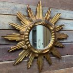 Miroir doré en bois
