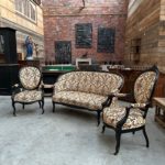 Paire de fauteuils Napoléon III en bois noirci